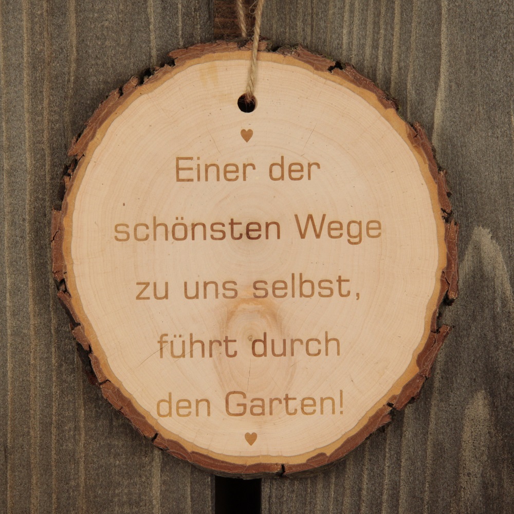 Baumscheibe "Einer der schönsten Wege zu uns selbst, führt durch den